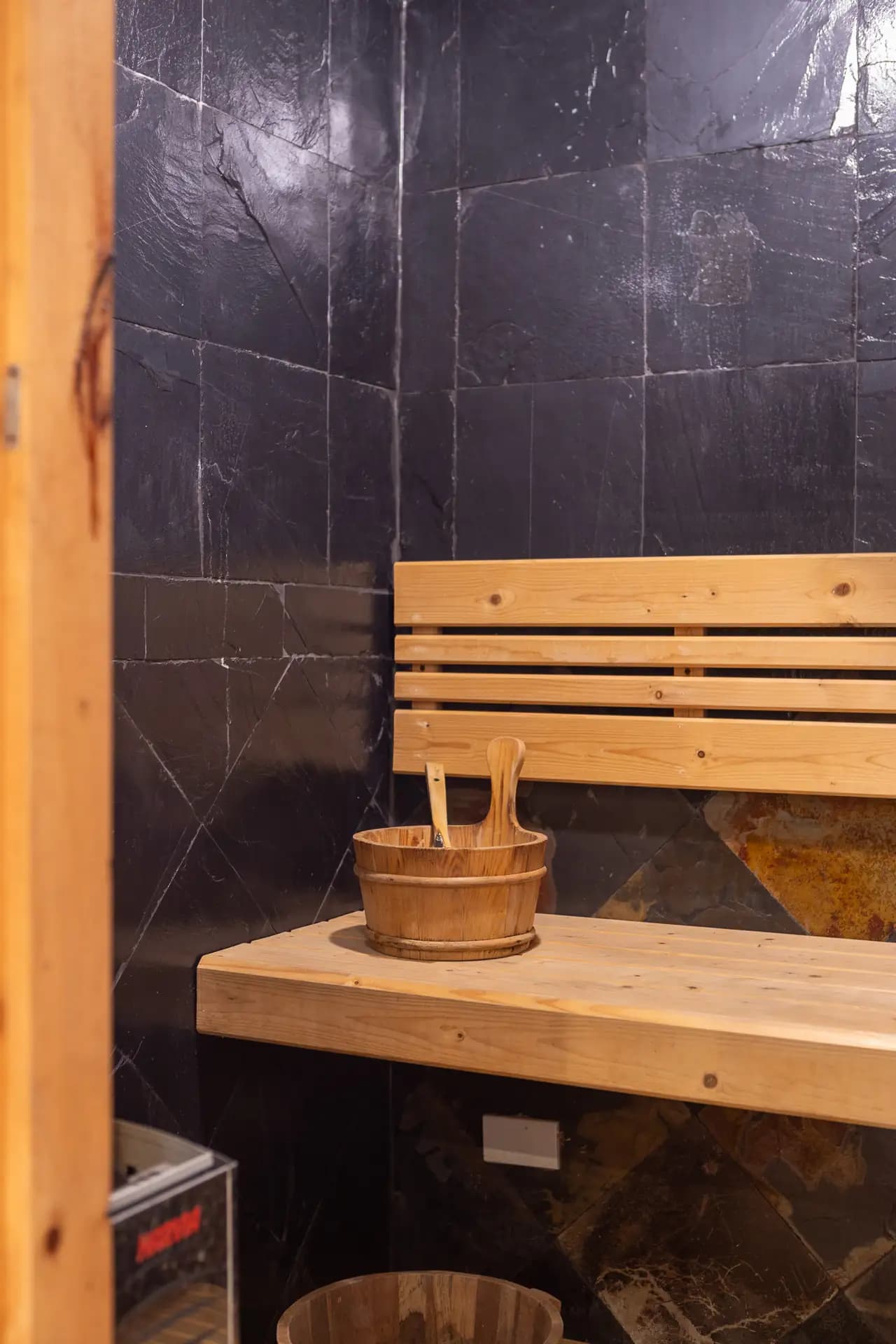 Sauna & Steam facility at The Nai Harn Collective boutique villa hotel in Phuket - Detox and reset in our traditional sauna and steam room, designed to support circulation, relaxation, and recovery.
